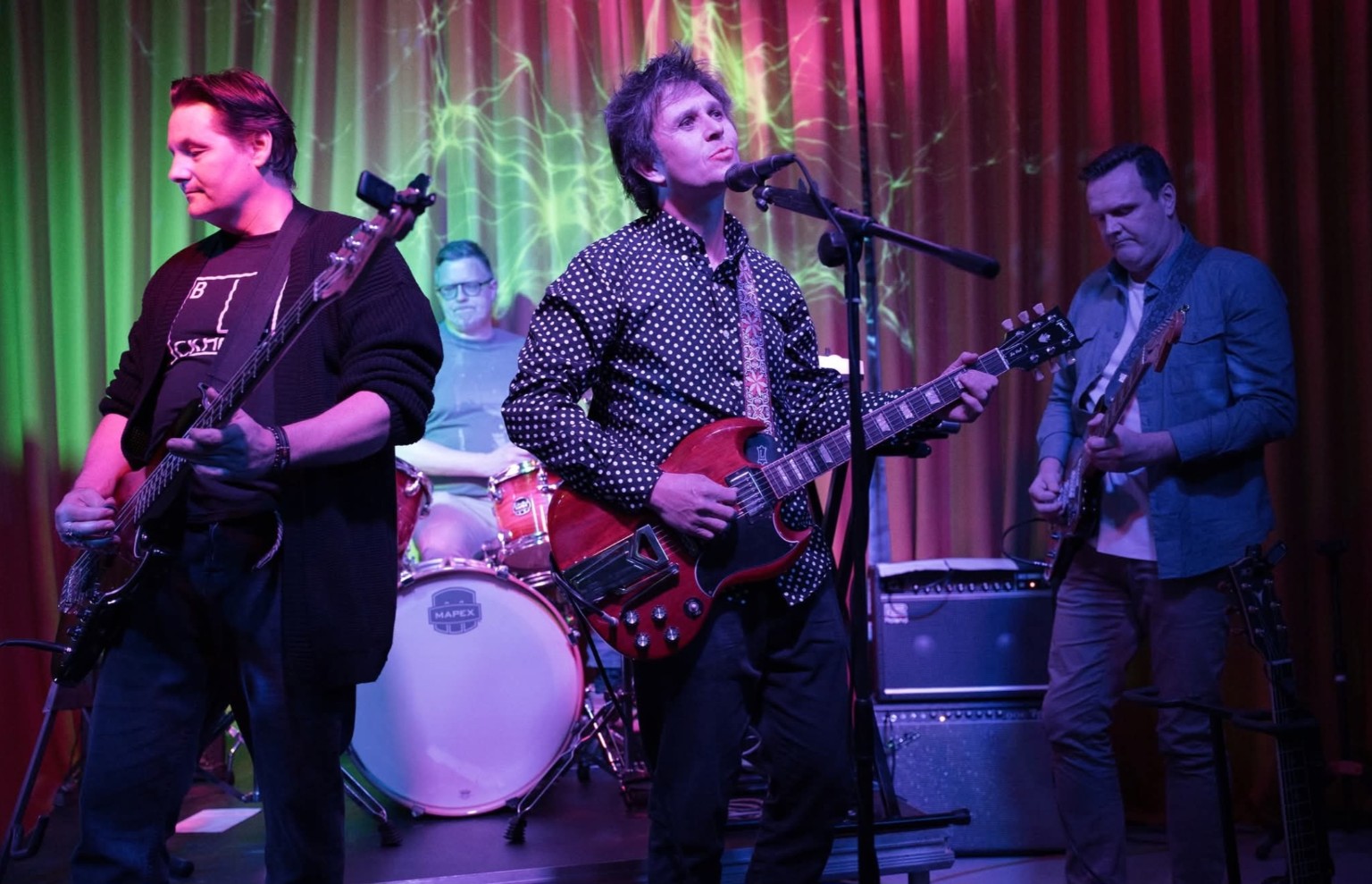Lee performing live with his band